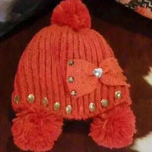 Knit hat orange color with rhinestones